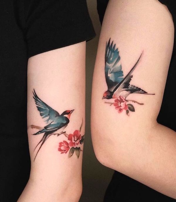 Matching colored swallow tattoos by @_.yiching._