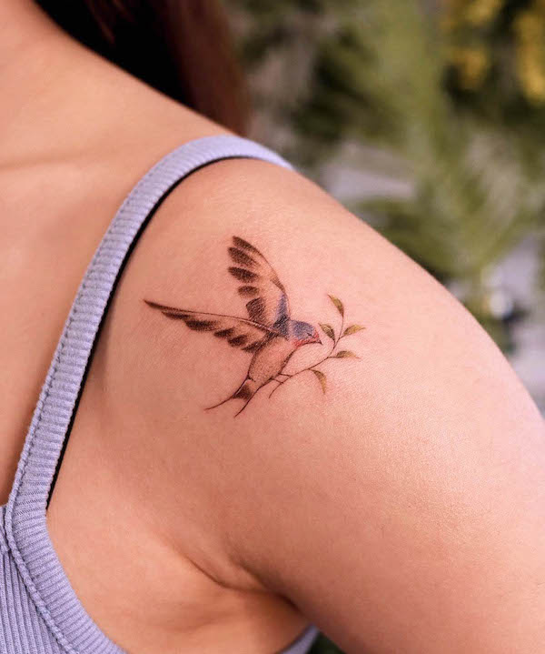 Tiny swallow with leaves by @noul_tattoo