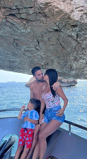 Fabregas pictured kissing partner Semaan