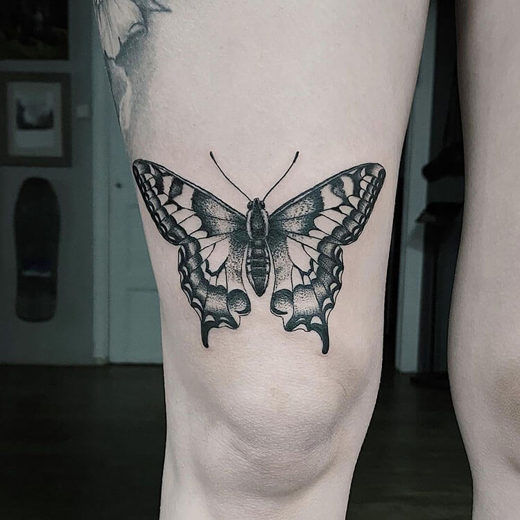 butterfly thigh tattoo