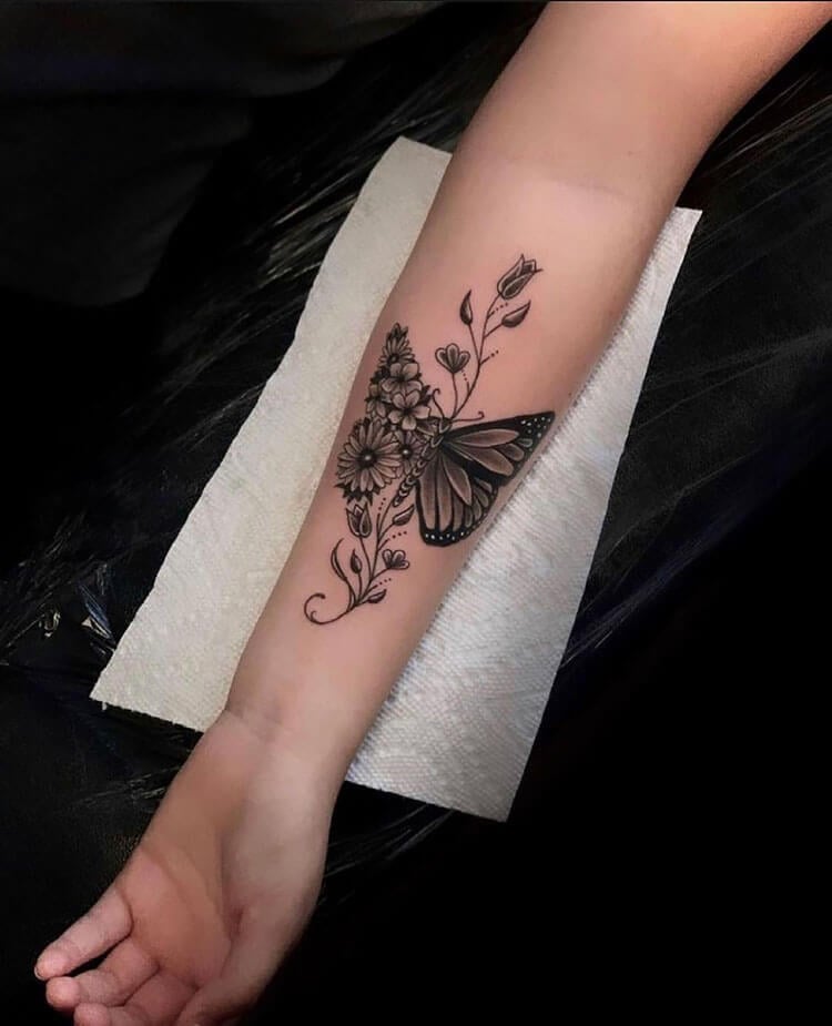 butterfly and flowers tattoo