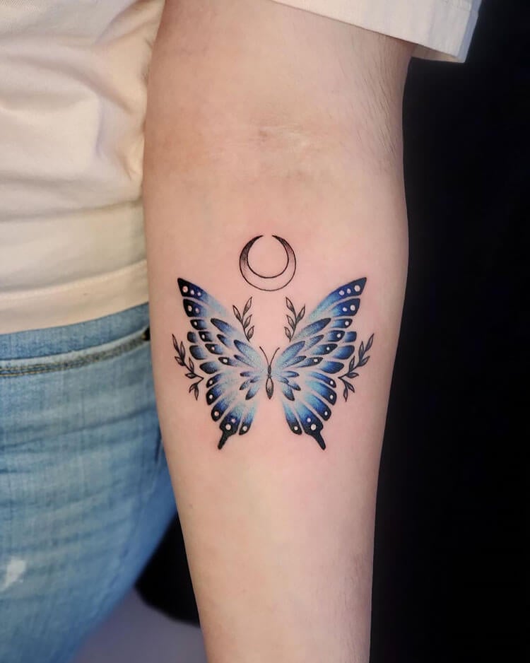 blue and black butterfly tattoo