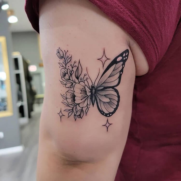 flower and star butterfly tattoo