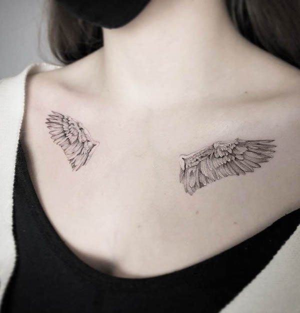 Angel wings chest tattoo by @tattoos.by_.sztrk