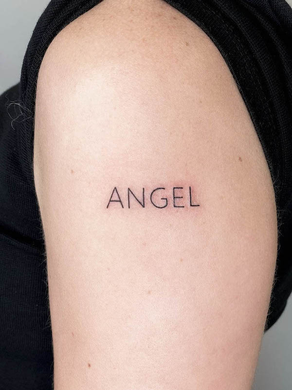 Angel one-word tattoo by @kyleytattoos