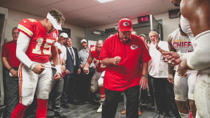 Travis Kelce leads Chiefs locker room celebrations after reaching the Super Bowl as Patrick Mahomes and Andy Reid deliver a rallying cry to their Kansas City team: 'We ain't done yet!'