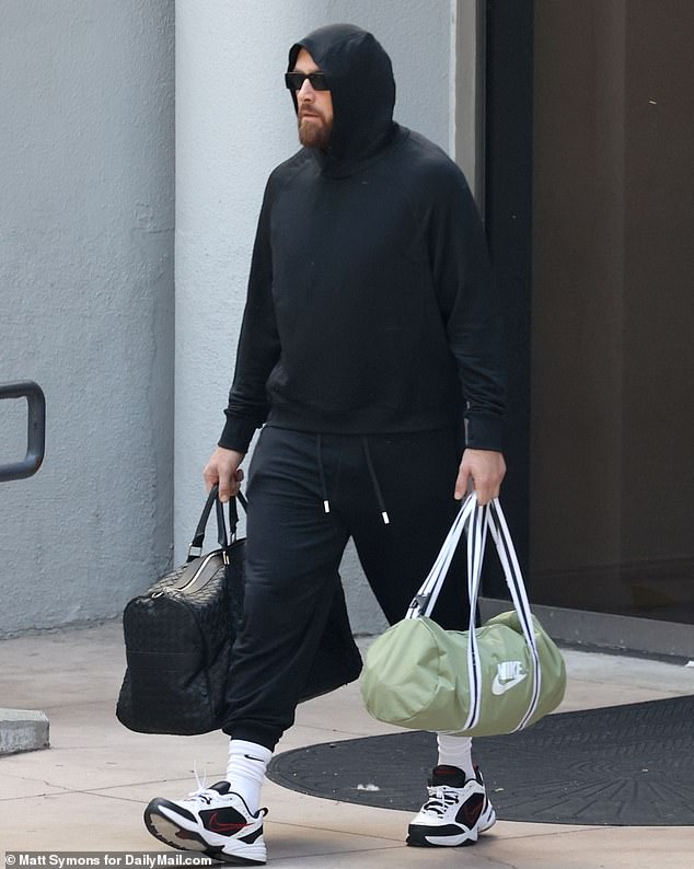 Travis Kelce looked glum as he stepped out of the team hotel in Los Angeles
