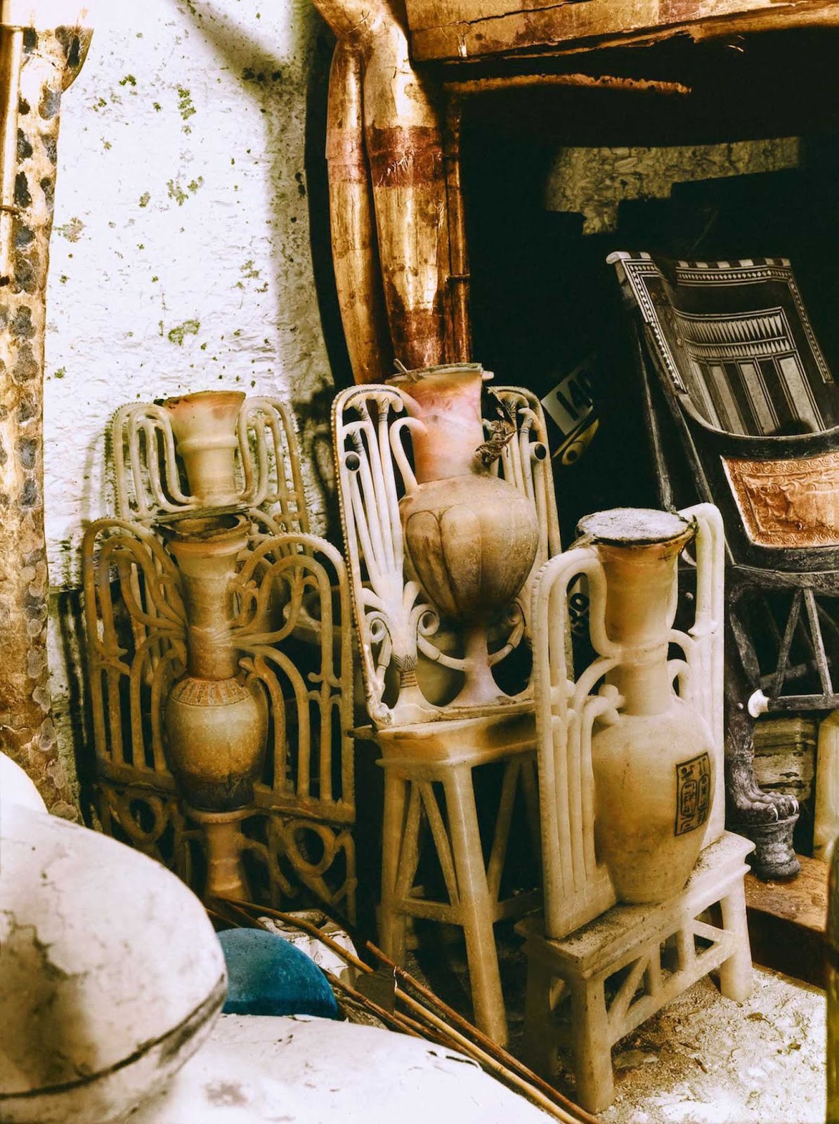 Ornately carved alabaster vases in the antechamber.