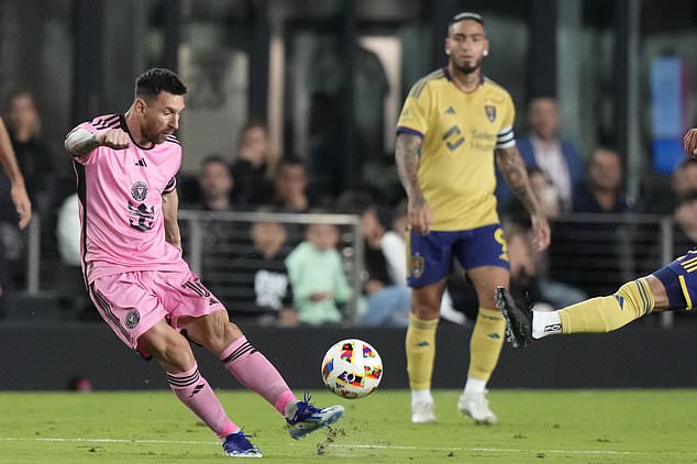 Inter Miami forward Lionel Messi, left, kicks the ball during the first half of the team's MLS soccer match against Real Salt Lake, Wednesday, Feb. 21, 2024, in Fort Lauderdale, Fla. (AP Photo/Lynne Sladky)