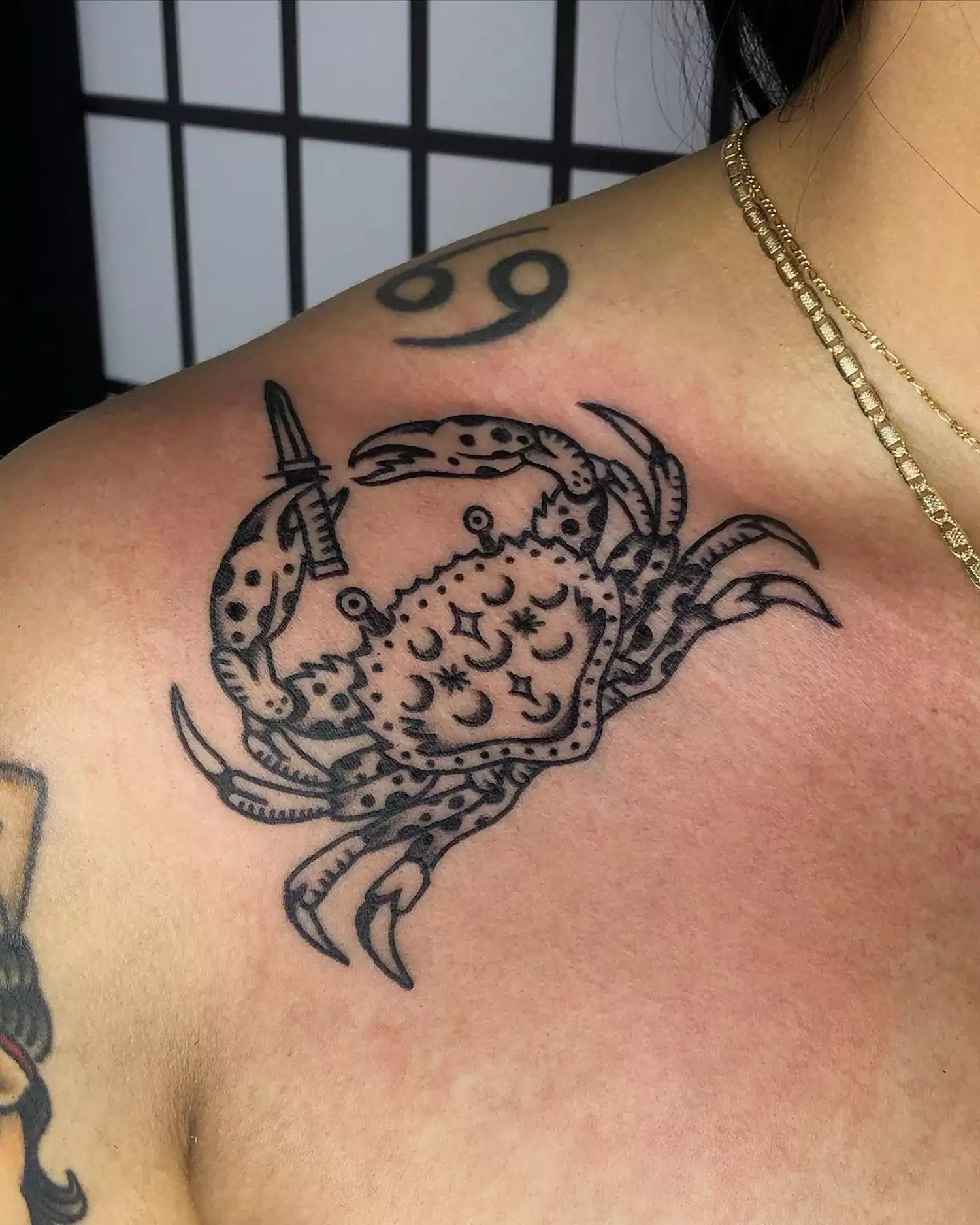 A cancer crab zodiac tattoo