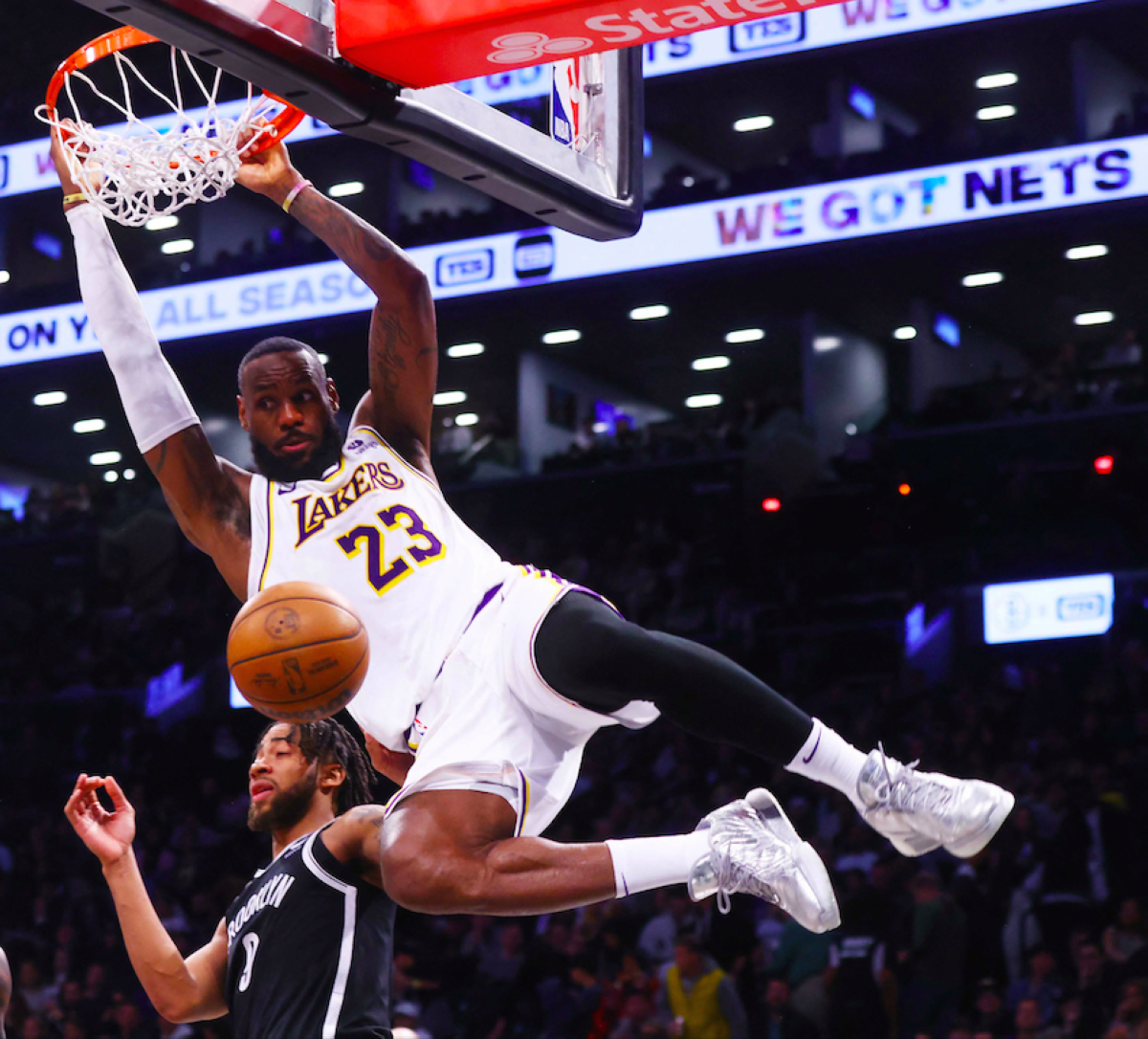 LeBron James of the Los Angeles Lakers dunks the ball against the Brooklyn Nets at Barclays Center on Sunday, March 31, 2024, in New York City.  AFP PHOTO
