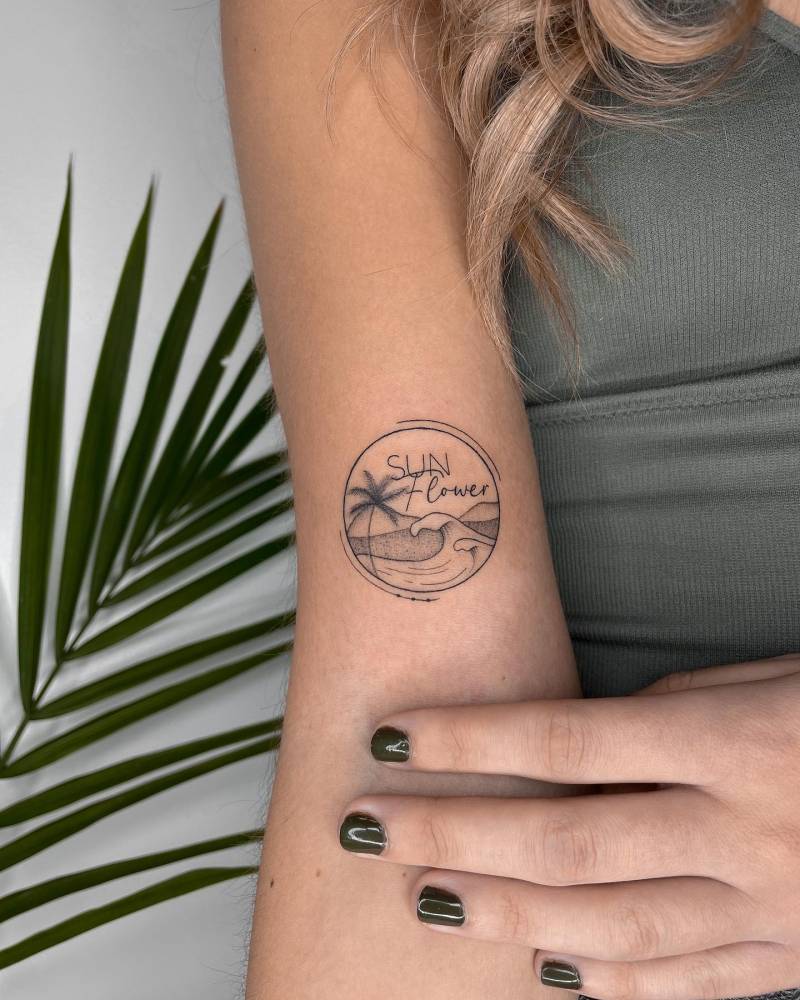 Fine line beach themed tattoo with word sunflower