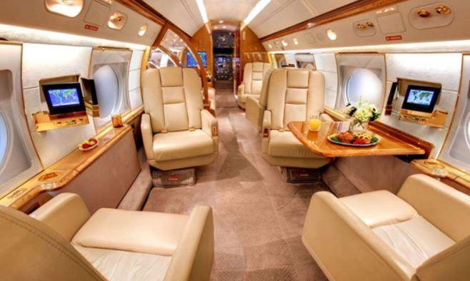 The private jet boasts a kitchen and two bathrooms