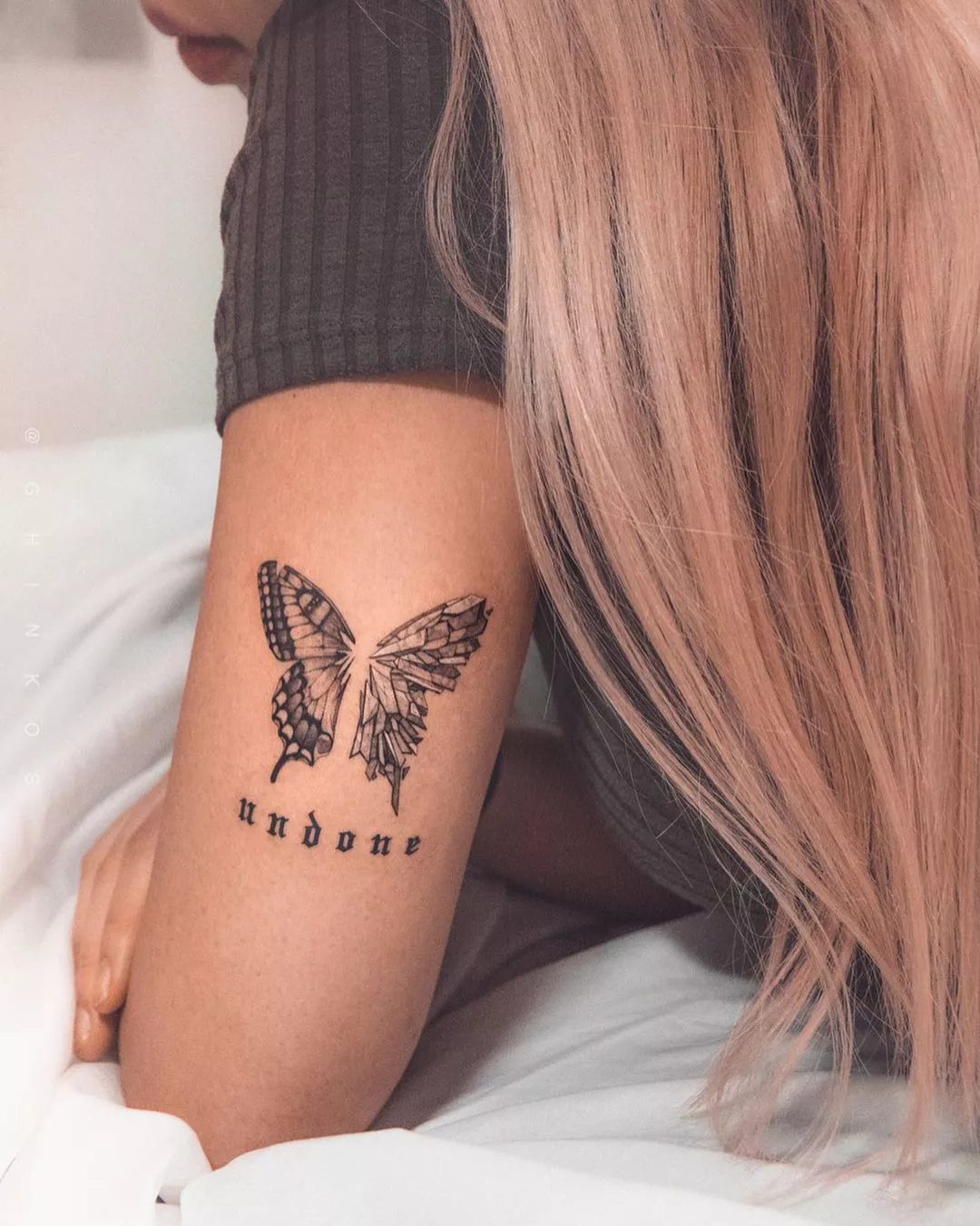 Butterfly tattoo on back of arm with different wings
