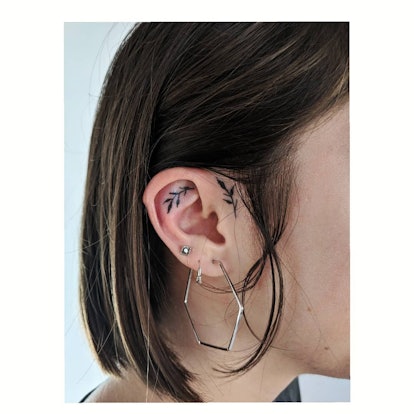 Inner ear tattoos are easy to hide.