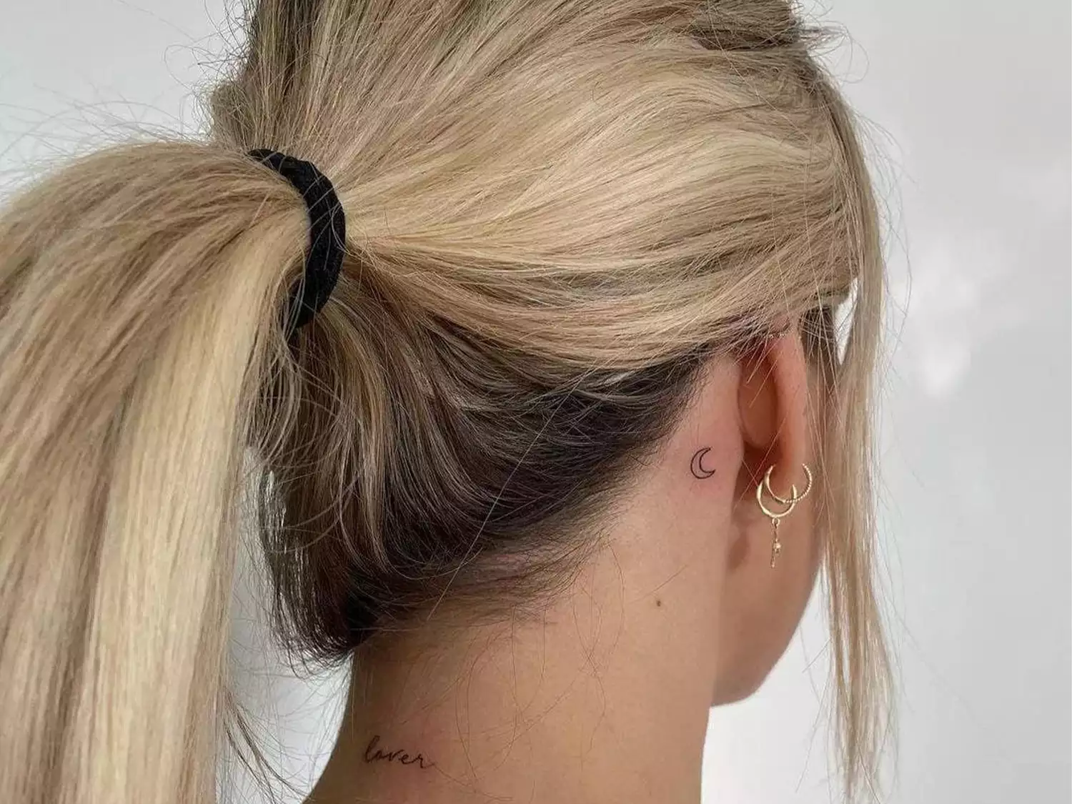 behind the ear moon tattoo