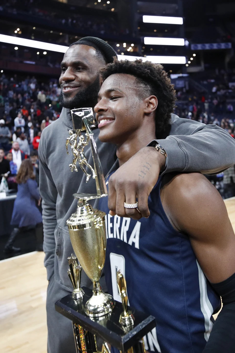 LeBron 'Bronny' James Jr. #0 of Sierra Canyon High School with his father LeBron James of the Los Angeles Lakers.