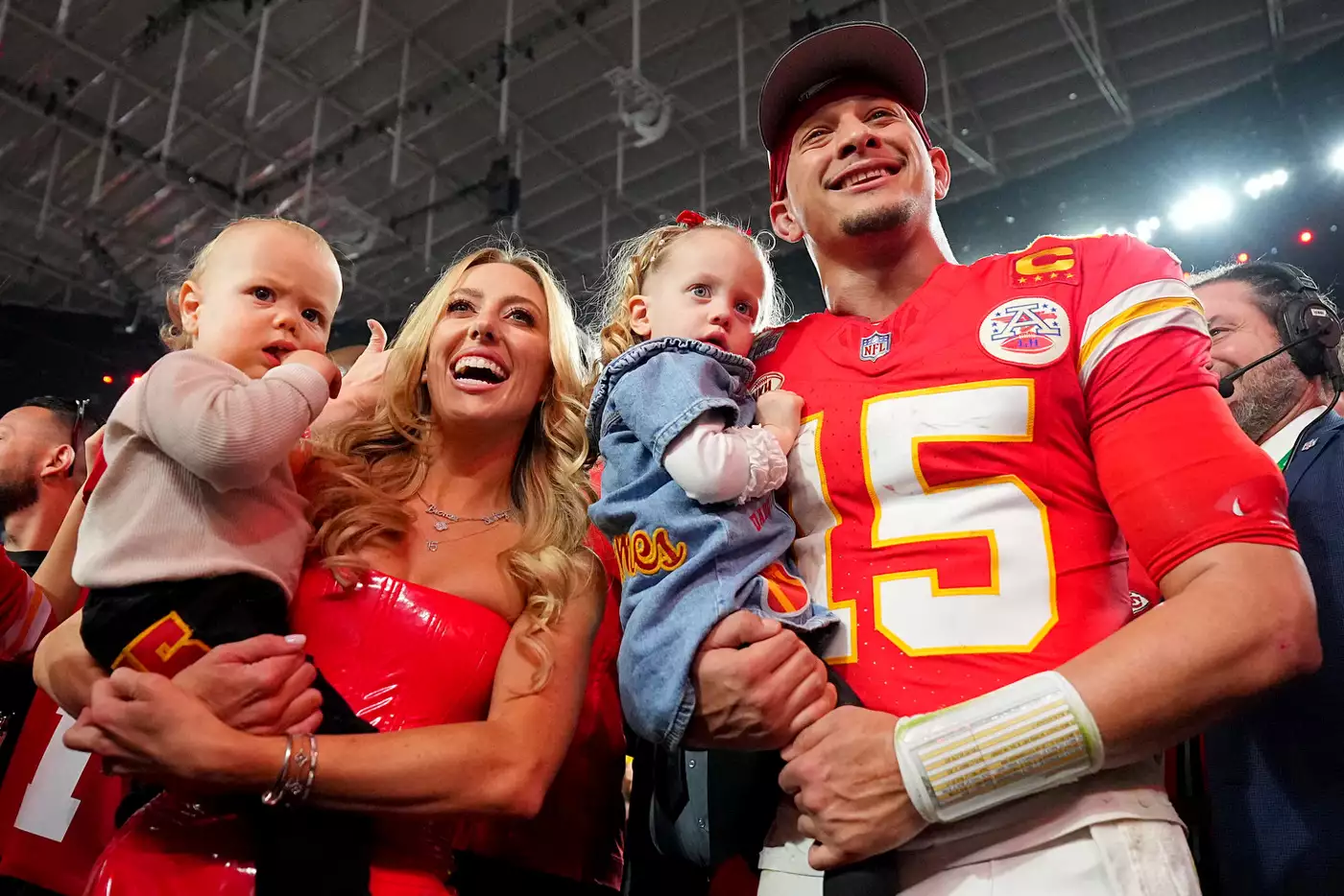 Super Bowl LVIII: Kansas City Chiefs Patrick Mahomes (15) poses with wife Brittany Mahomes and their 𝘤𝘩𝘪𝘭𝘥ren Patrick Bronze and Sterling Skye following victory vs San Francisco 49ers at Allegiant Stadium.