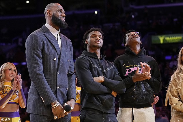 LeBron was seen leaving the restaurant alongside Bronny and his other son Bryce (right)