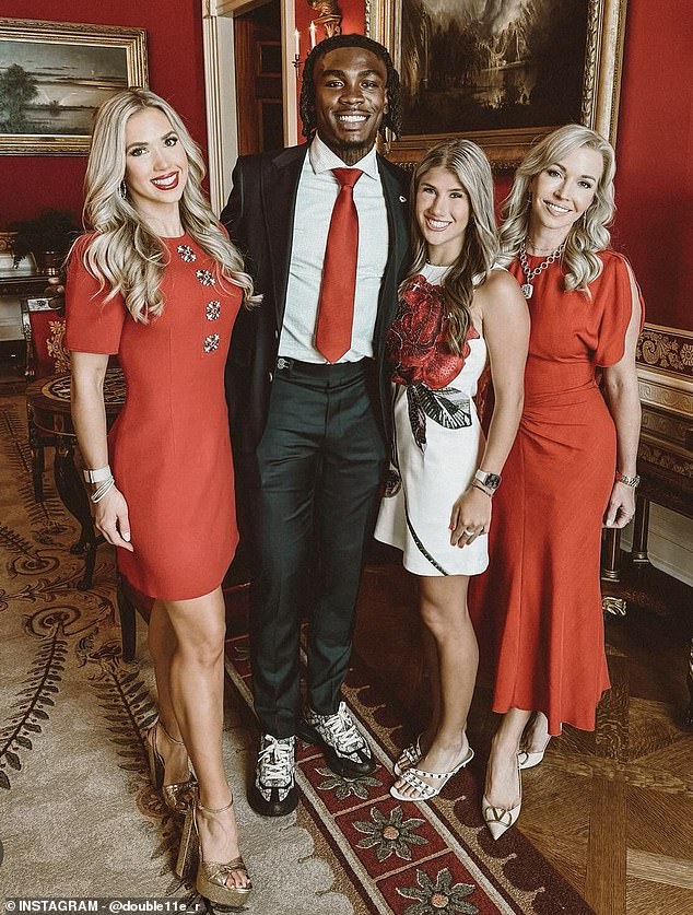 Receiver Rashee Rice posed with owner Clark Hunt's wife and daughters on Friday
