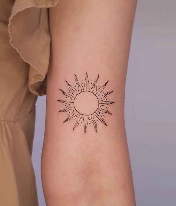 Simple sun tattoo on the arm by @gytamara_tattoo