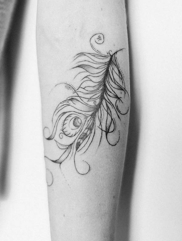 Fine-line feather tattoo by @mahitattoohouse