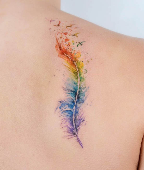 Watercolor rainbow feather tattoo by @amanda.mypreciousink