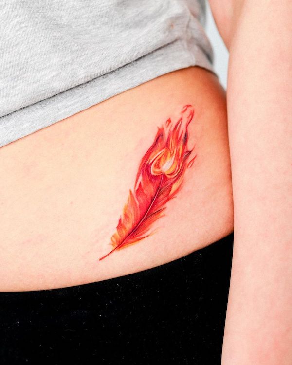 Burning red phoenix feather tattoo by @guseul_tattoo