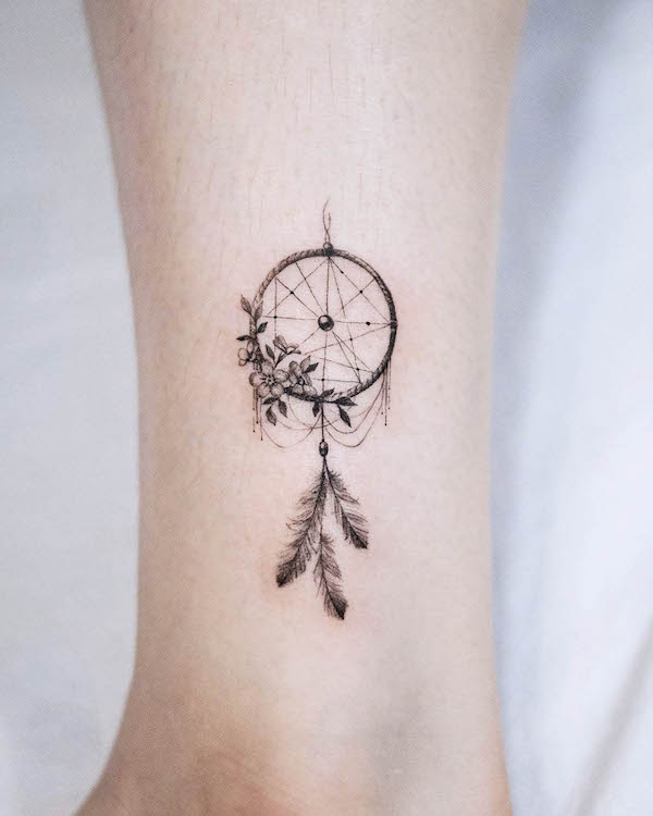 Small dreamcatcher ankle tattoo by @handitrip