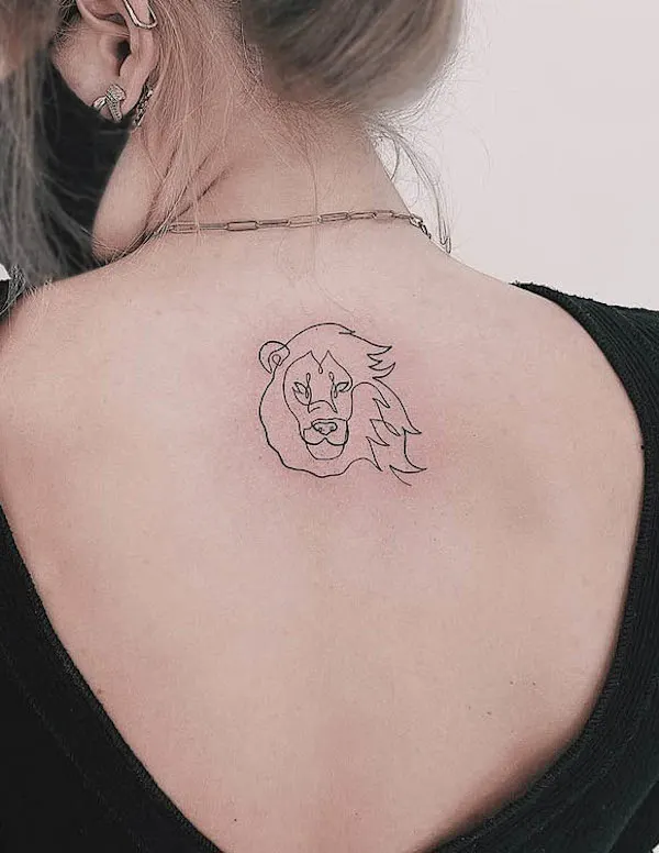 Fine-line lion back tattoo by @cellatattoo
