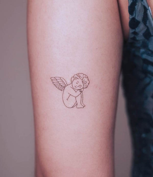 Cute angel fine line tattoo by @clealtattoo