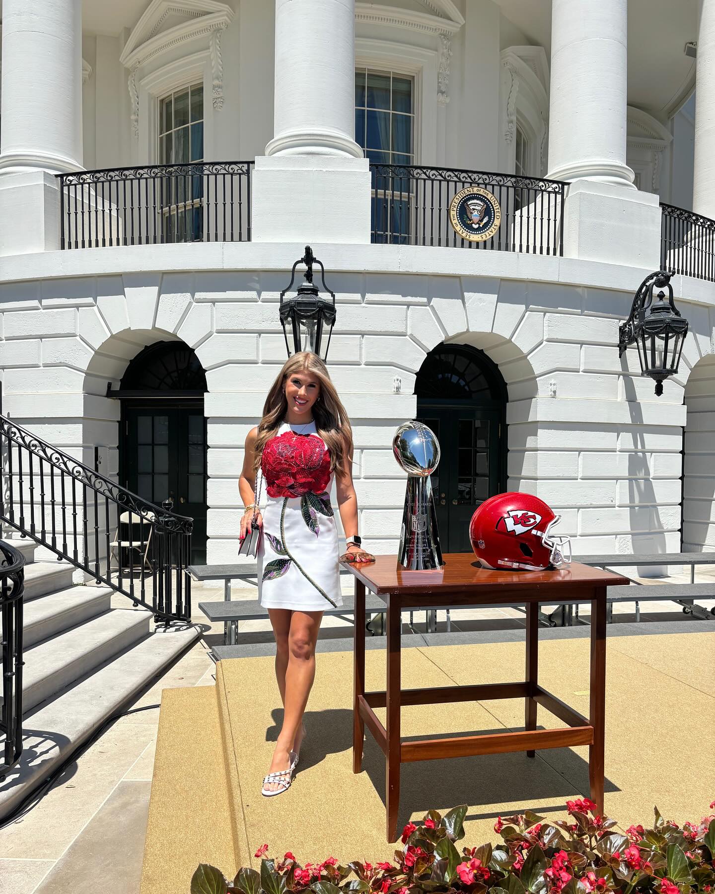 Ava Hunt posing in front of the White House