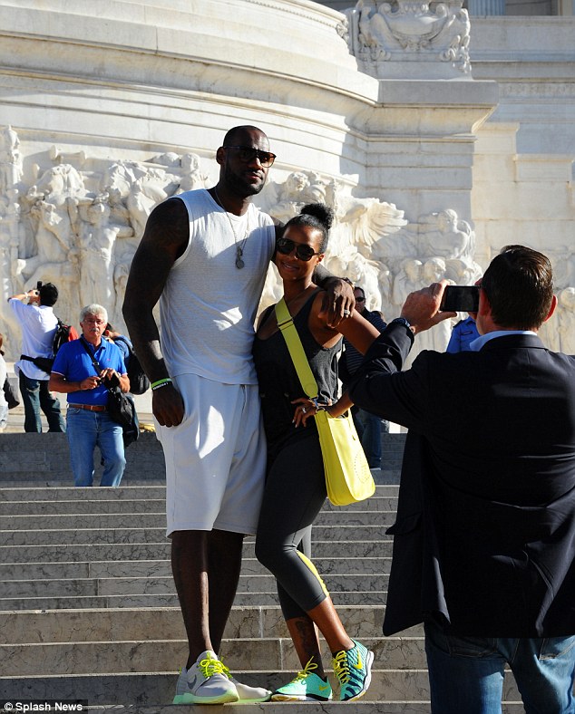 One for the family album: They both wore matching sporty outfits as they wandered through the Altare della Patria