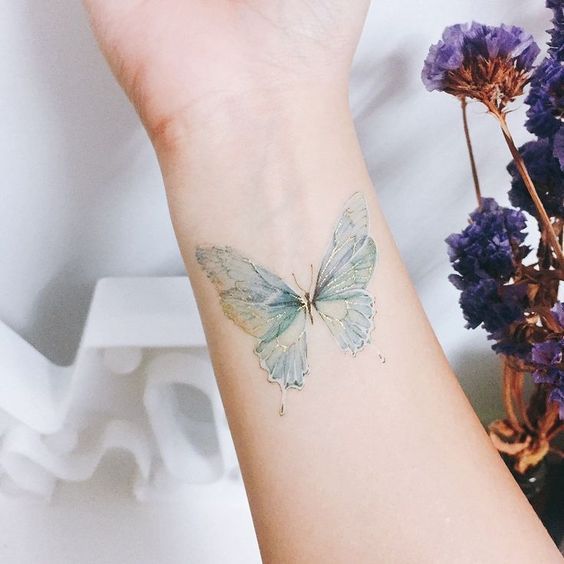 Explore 25 Unique Watercolor Butterfly Tattoo Ideas for 2024: Stunning Designs for Women – Arm, Back, and Hand Styles