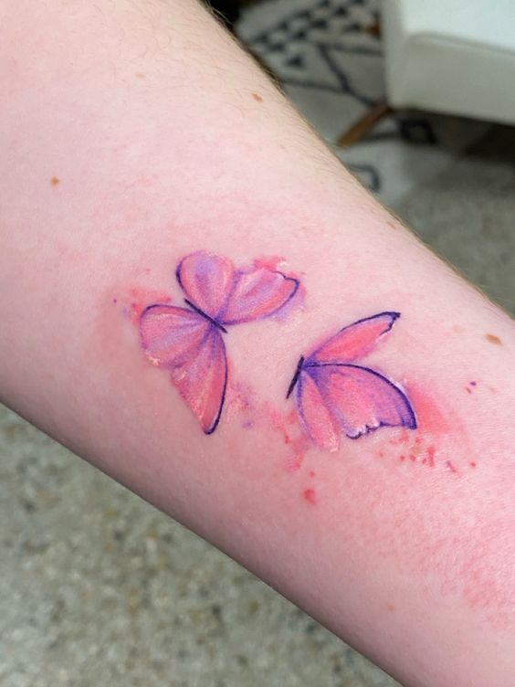 Explore 25 Unique Watercolor Butterfly Tattoo Ideas for 2024: Stunning Designs for Women – Arm, Back, and Hand Styles