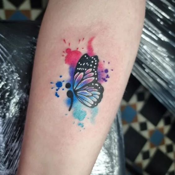 Explore 25 Unique Watercolor Butterfly Tattoo Ideas for 2024: Stunning Designs for Women – Arm, Back, and Hand Styles