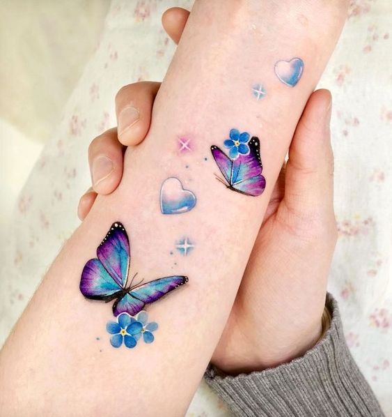 Explore 25 Unique Watercolor Butterfly Tattoo Ideas for 2024: Stunning Designs for Women – Arm, Back, and Hand Styles