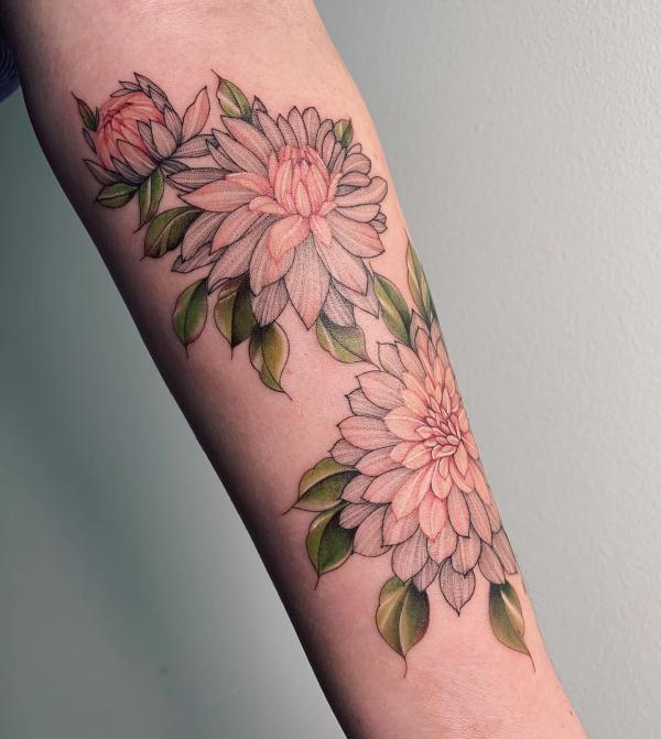 Light pink forearm tattoo