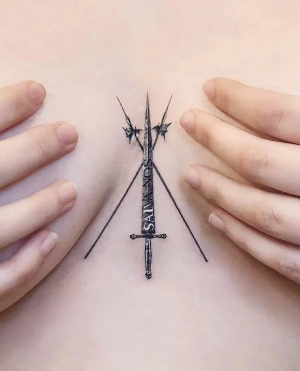 The Three of Sword tattoo between boob by @stuffie.ink_