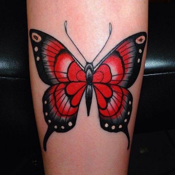 Traditional black and red butterfly tattoo