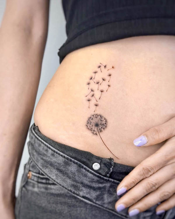 Dandelion waist tattoo by @kentip_789tattoo