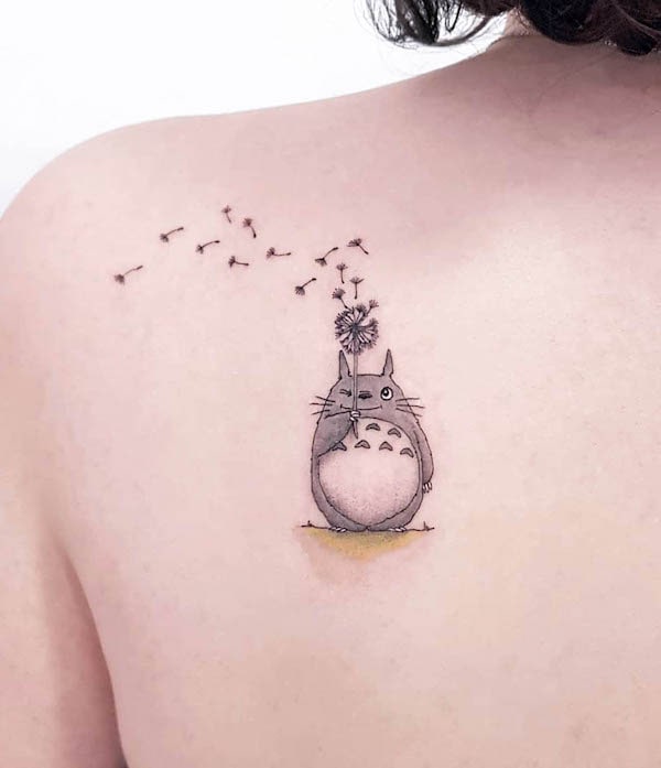 Totoro with a dandelion tattoo by @by_vas