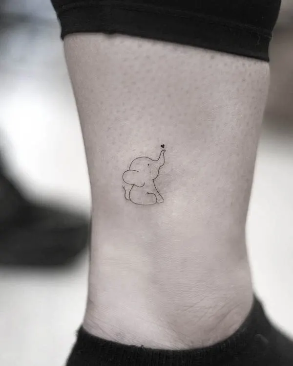 Cute baby elephant ankle tattoo by @ee_ink