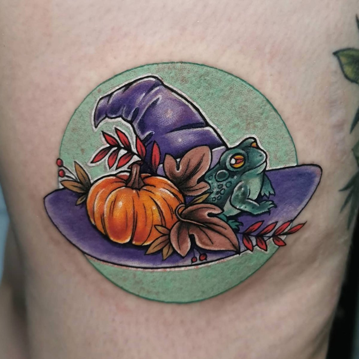 Witch hat with frog tattoo