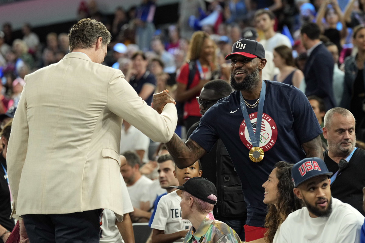 Pau Gasol shakes hand with Lebron James at the U.S. women's gold medal match; © Kyle Terada-USA TODAY Sports