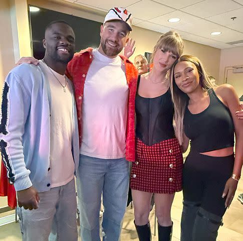 Ayan Broomfield/Instagram Frances Tiafoe, Travis Kelce, Taylor Swift and Ayan Broomfield pose for a photo as Scott Swift photobombs