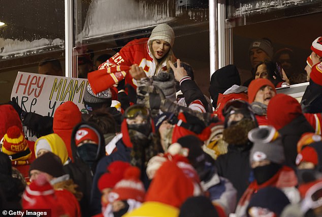 Swift was all too keen to interact with the delighted Chiefs fan sat in front of her suite