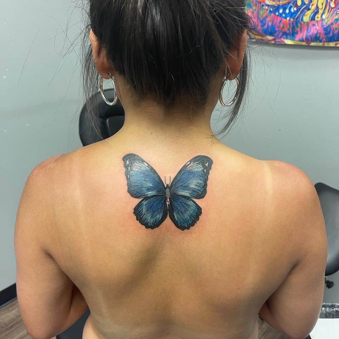 Butterfly Inspired Spine Tattoo