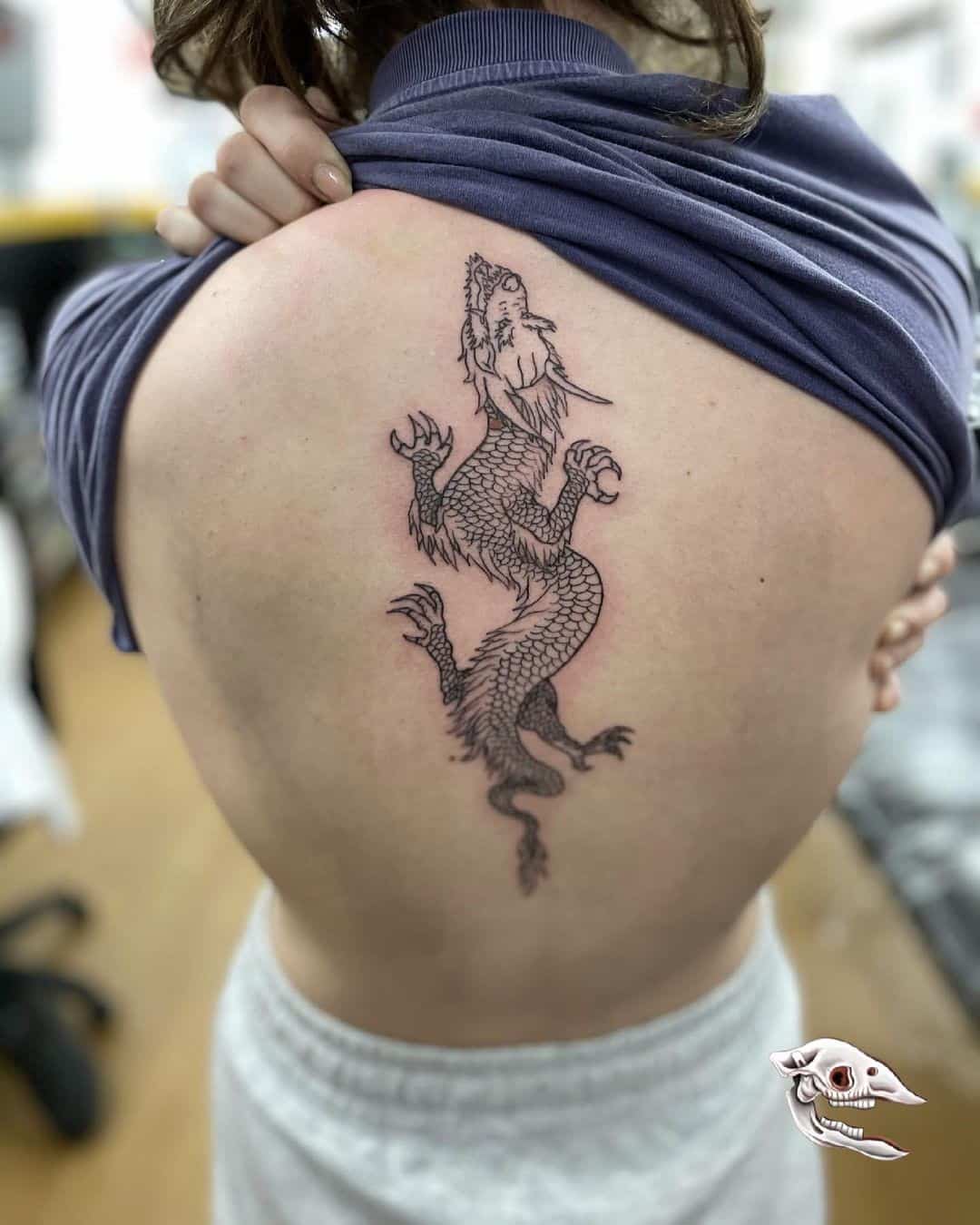 Dragon Inspired Spine Tattoo For Women