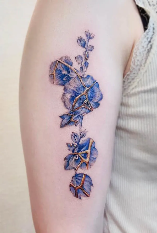 Kintsugi porcelain flowers tattoo by @winigreeni